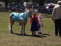 Costume class, MT St. Fair, pony is Elsa, Daphne is Anna, Drake is Olof from "Frozen"